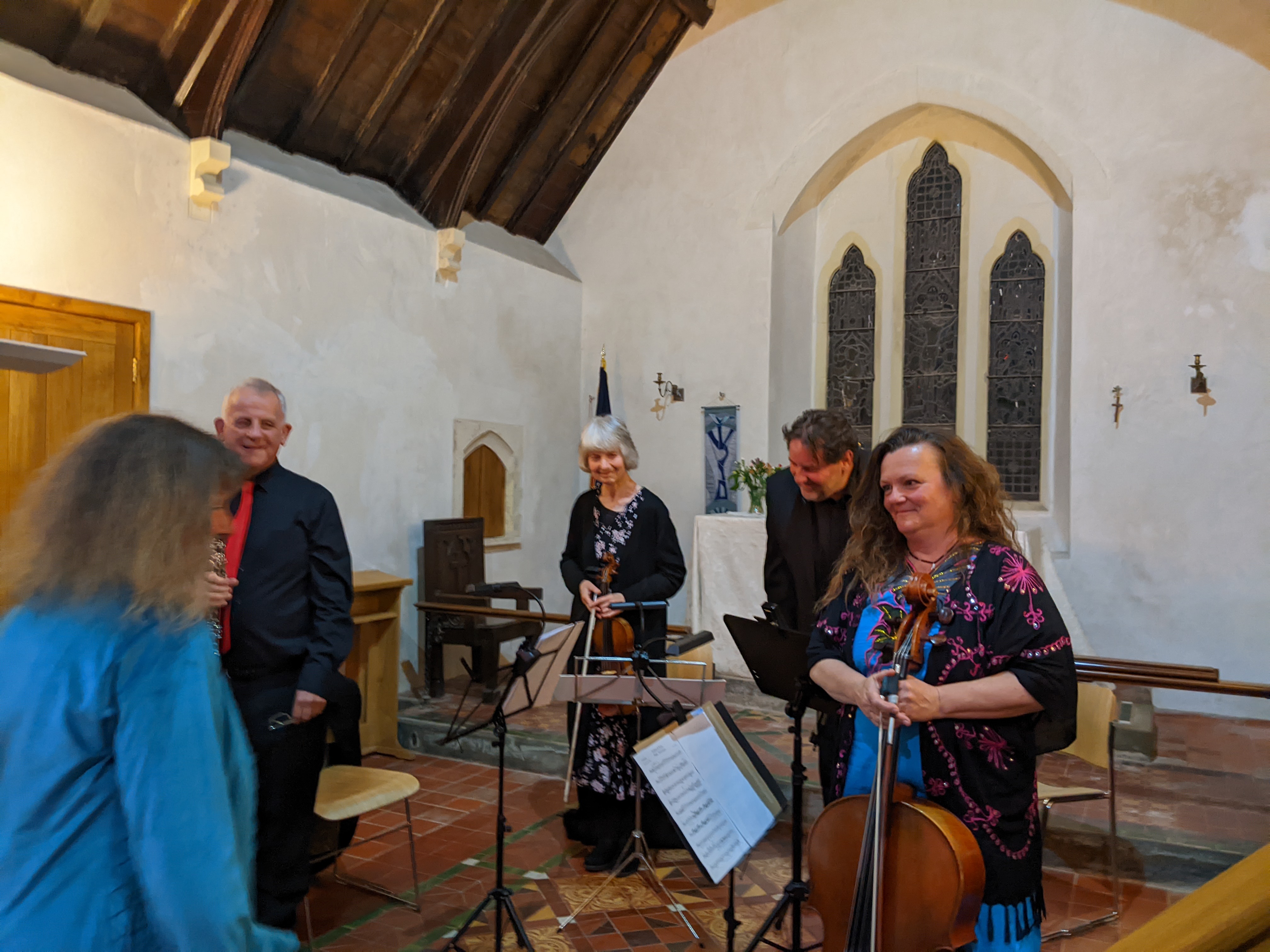 St Woolos Sinfonia principals oboe quartet receives Fiona onto the stage